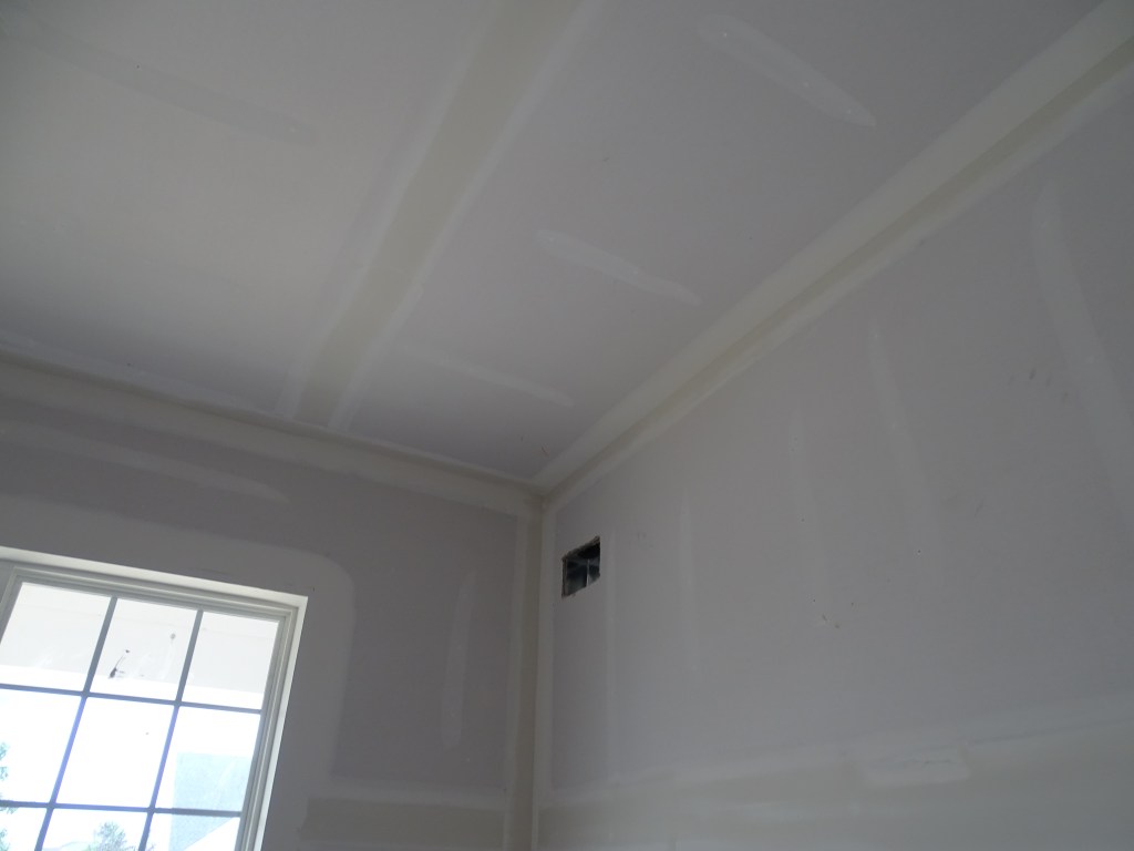 corner of room with custom spot for outlet cut out