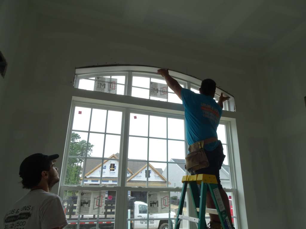 javier finishing up window trimming