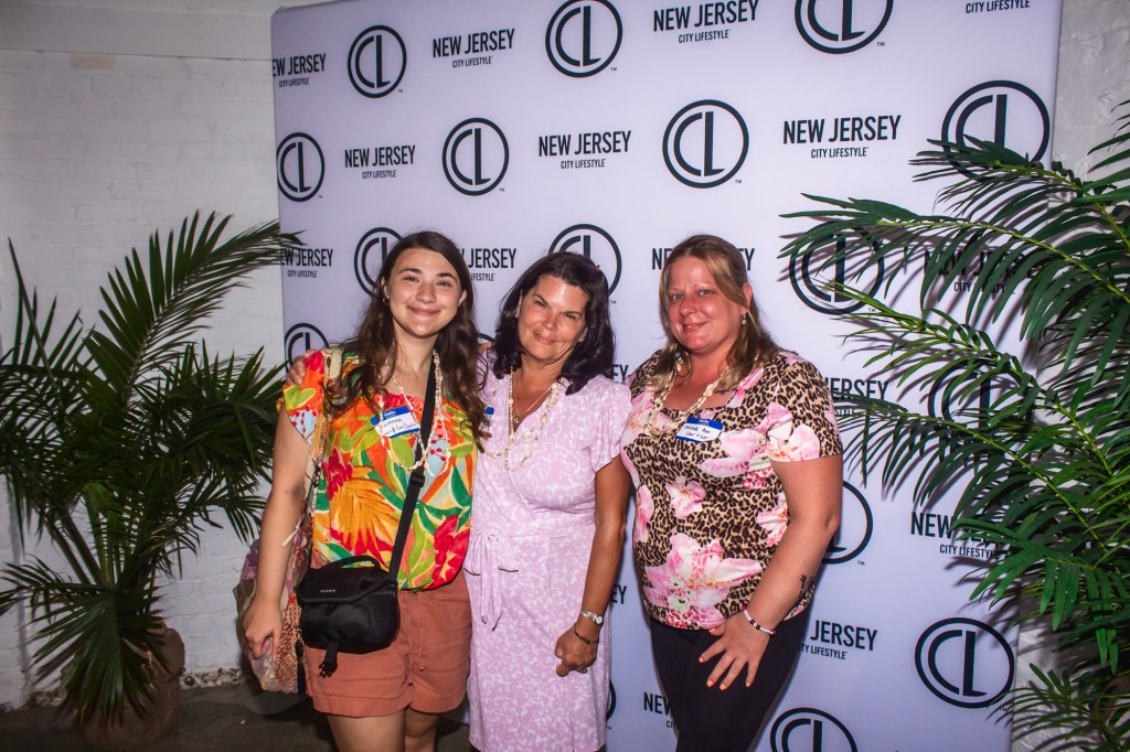 Louis and Sons office crew at the Greater Long Branch City Lifestyle luau party 