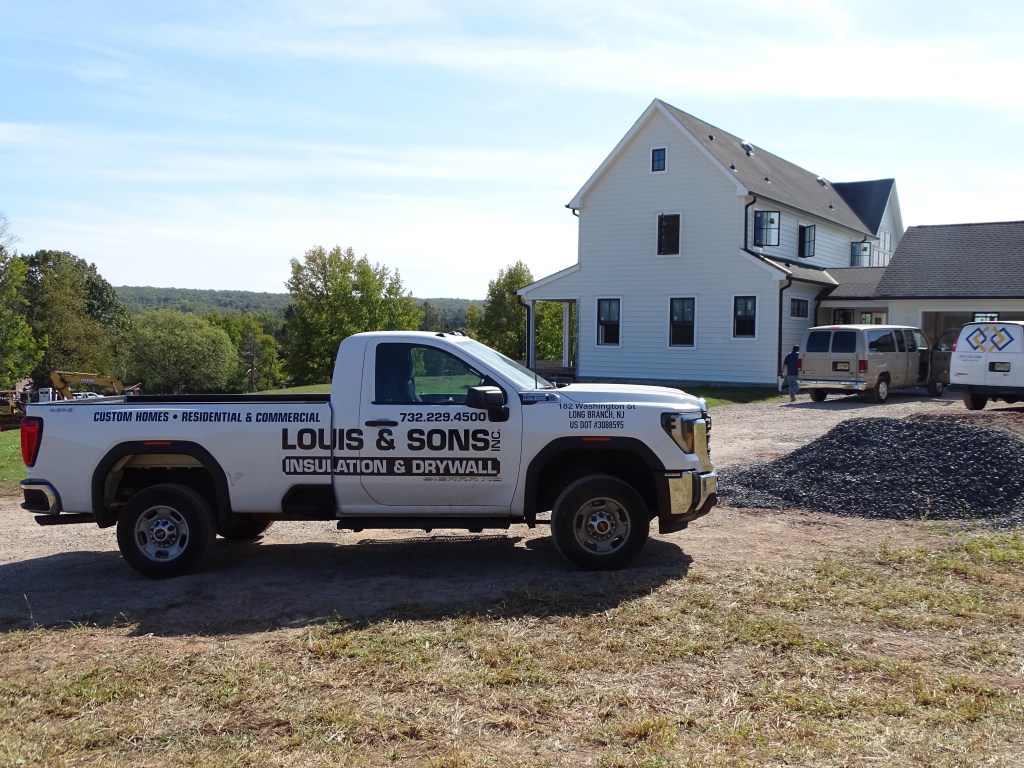 Louis & Sons truck in front of house in front of house in Ringoes, NJ