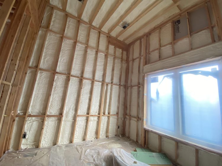 spray foam wall house in Livingston, NJ at an angle near window